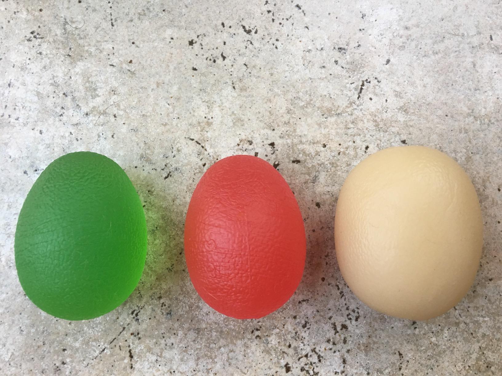CanDo Digi-Squeeze Übungsgelball rot leicht oval